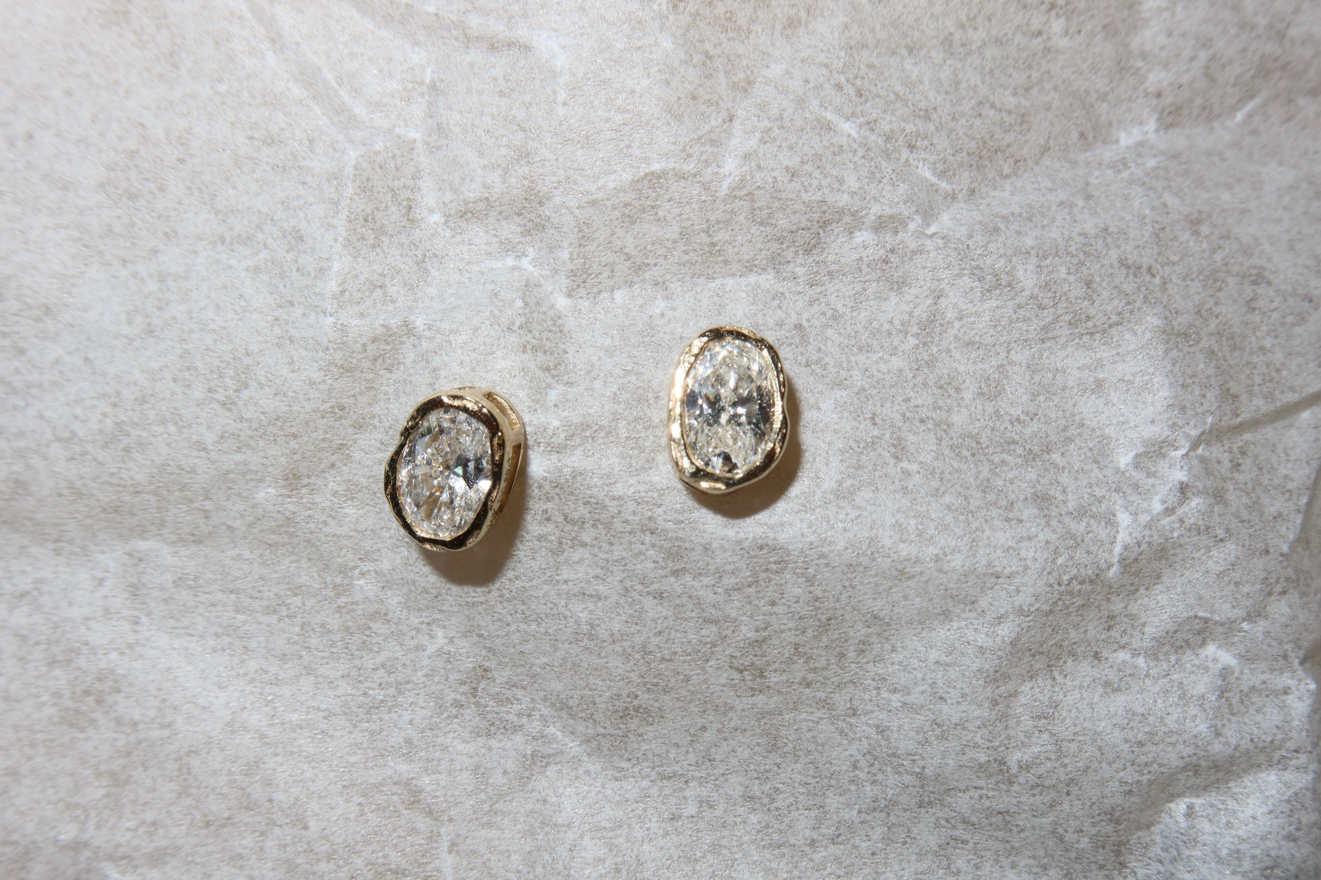 melted oval lab diamond stud earrings in 10 karat yellow gold
