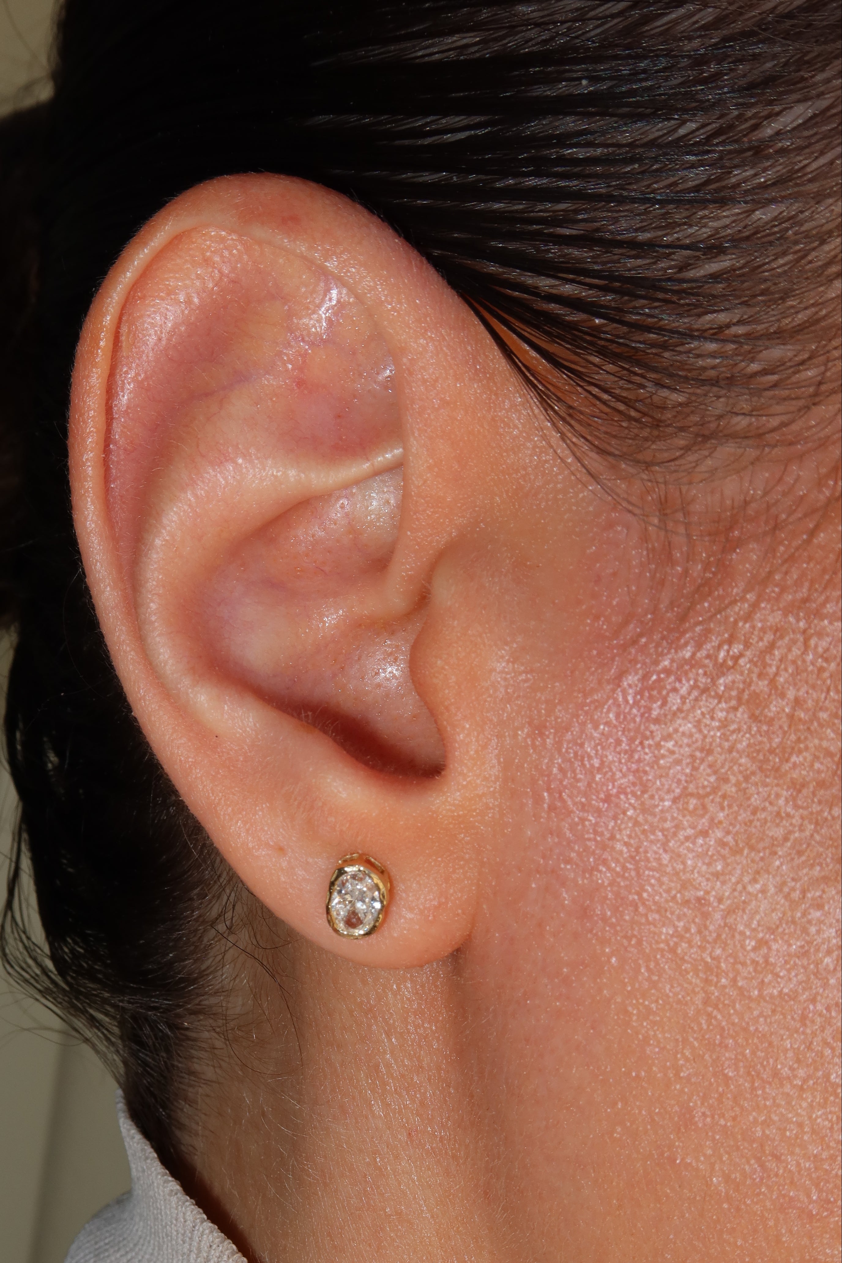 melted oval lab diamond stud earrings in 10 karat yellow gold