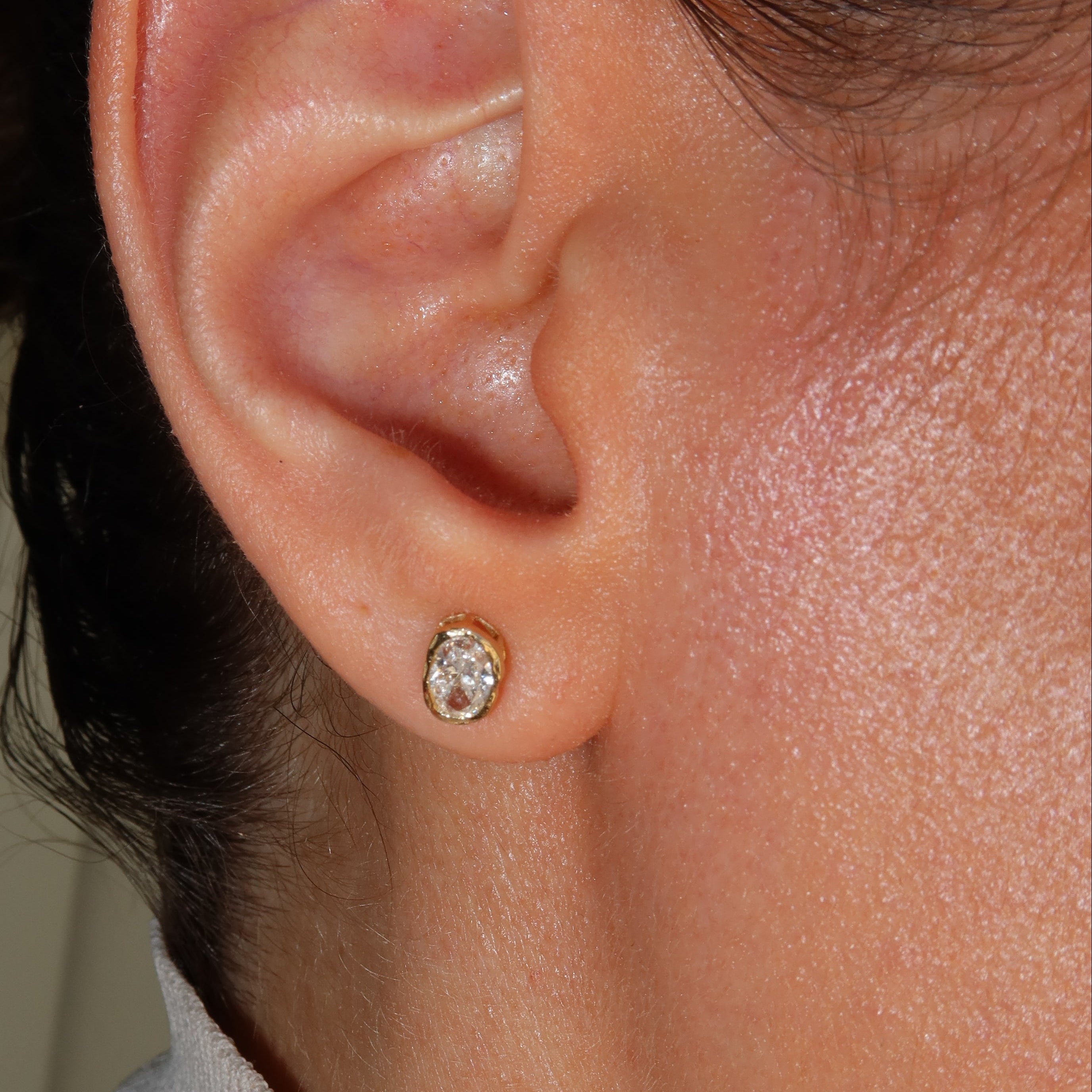 melted oval lab diamond stud earrings in 10 karat yellow gold