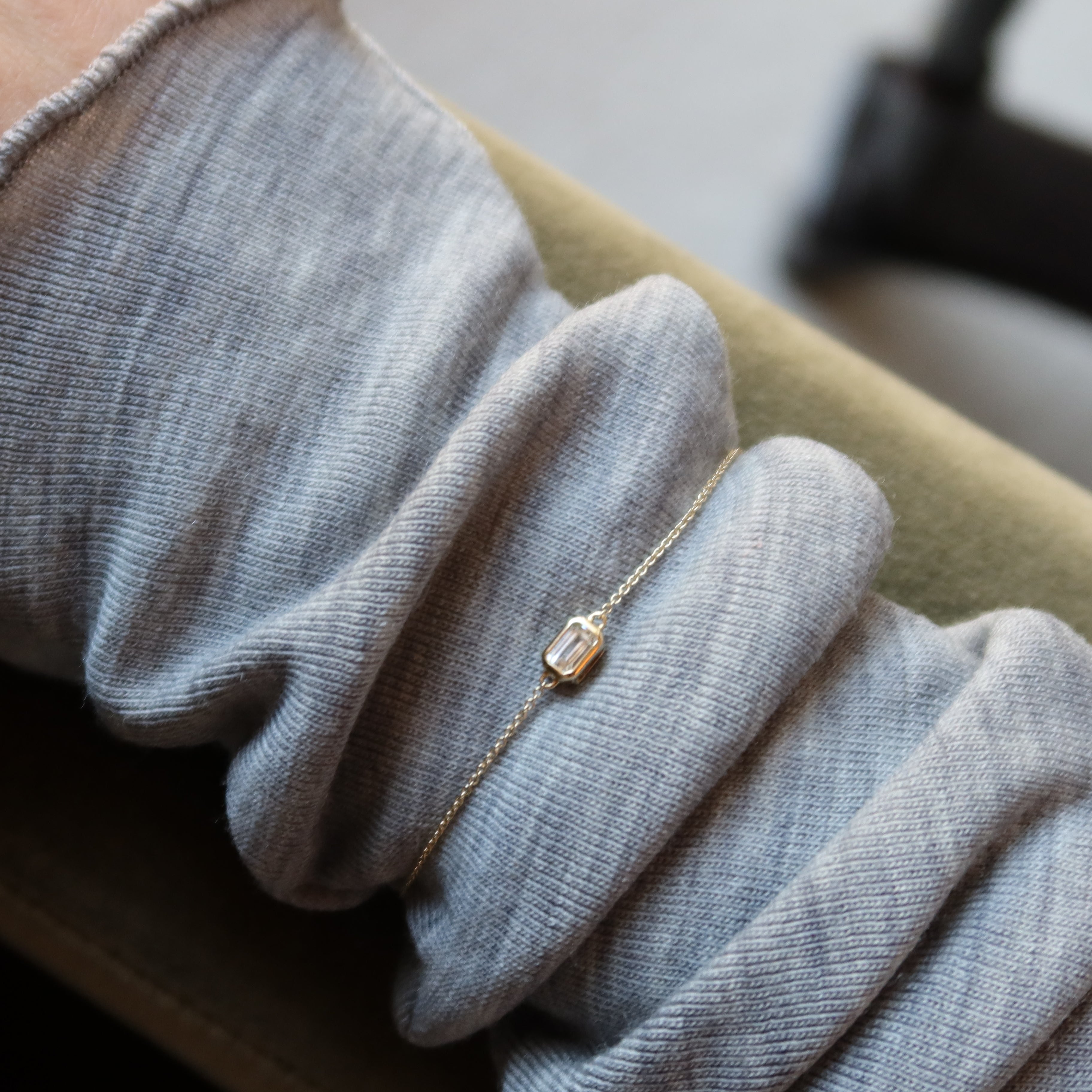 dainty solid gold bracelet with white sapphire