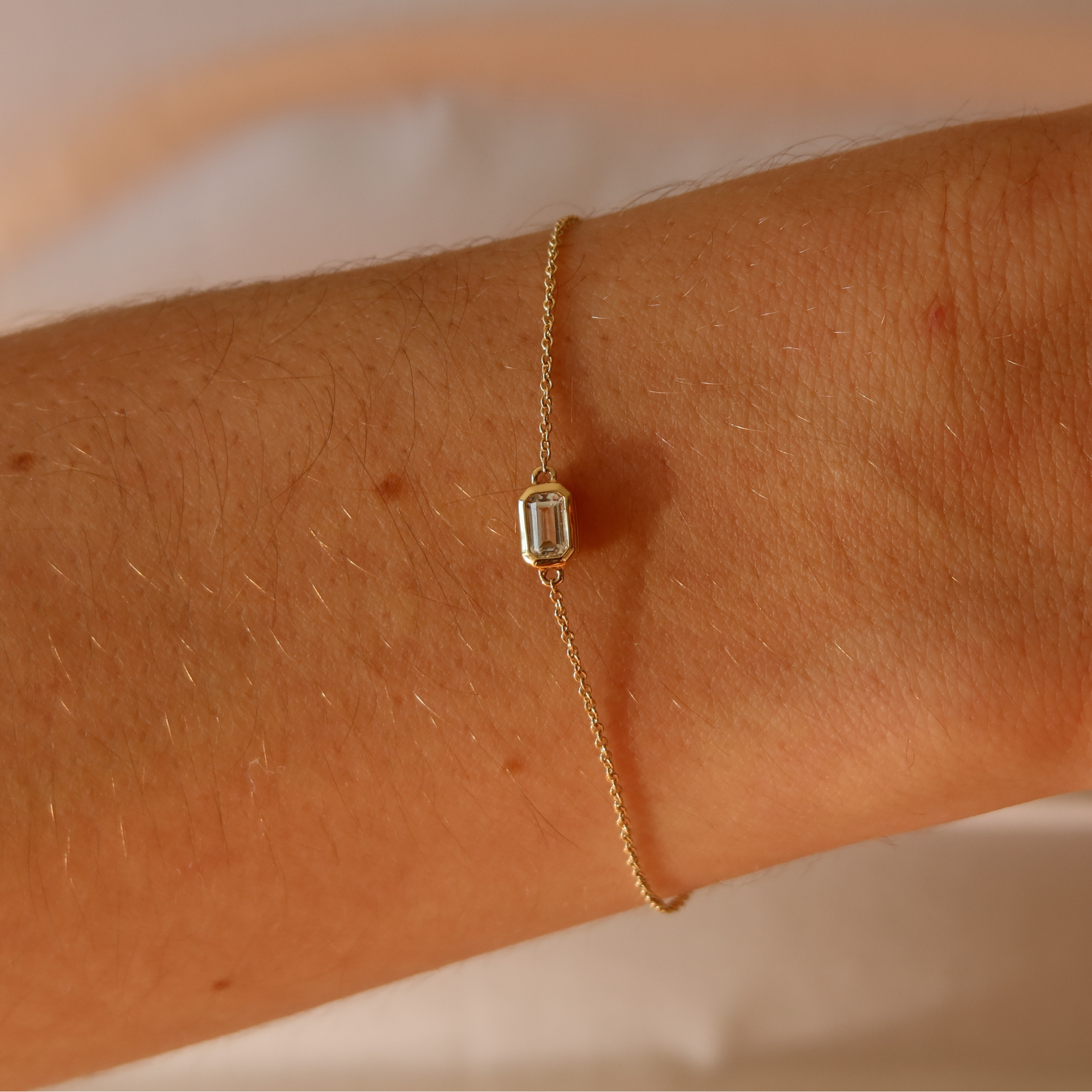 gold bracelet with white sapphire stone - gifting ideas for her australia