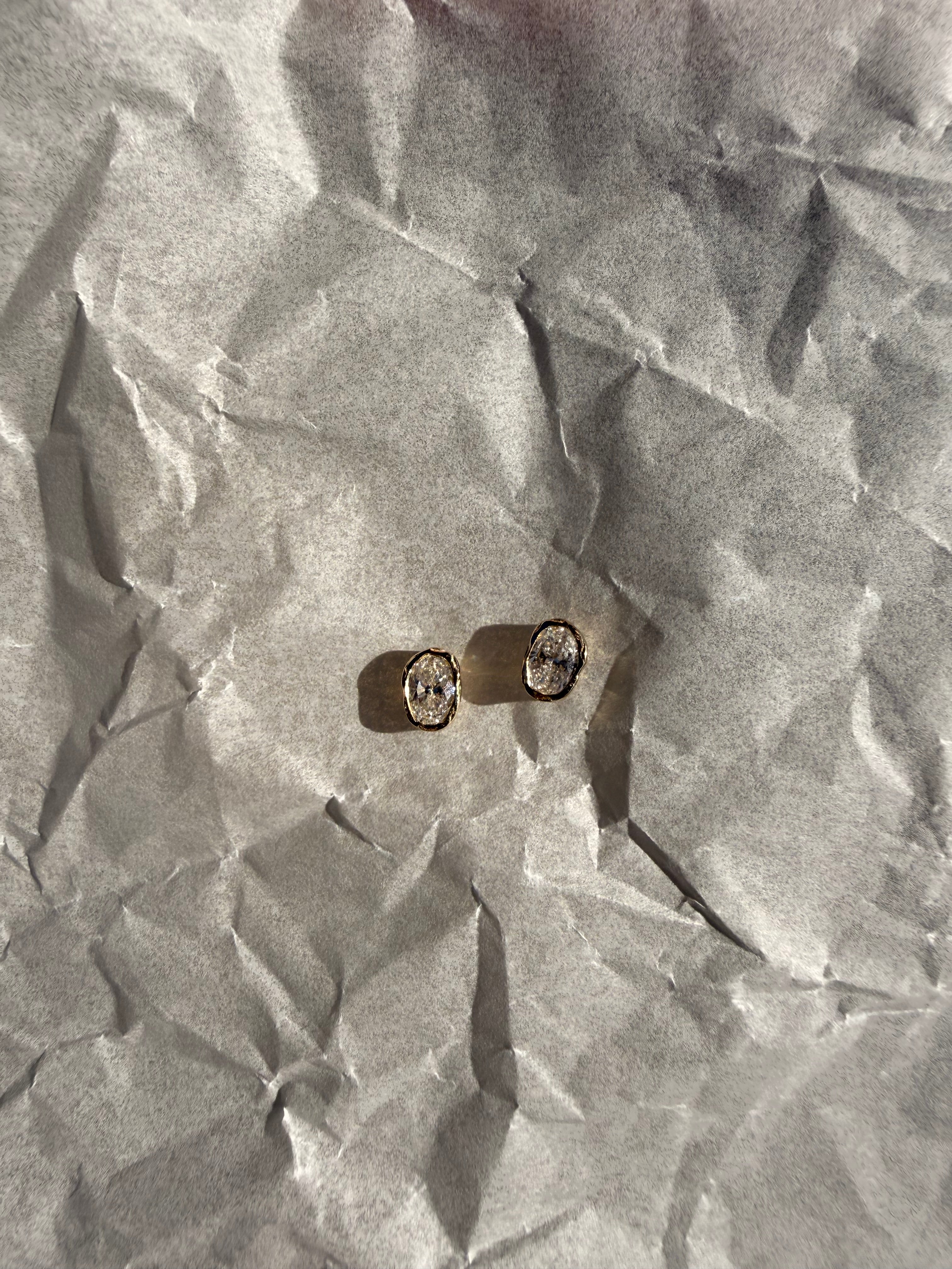 melted oval lab diamond stud earrings in 10 karat yellow gold