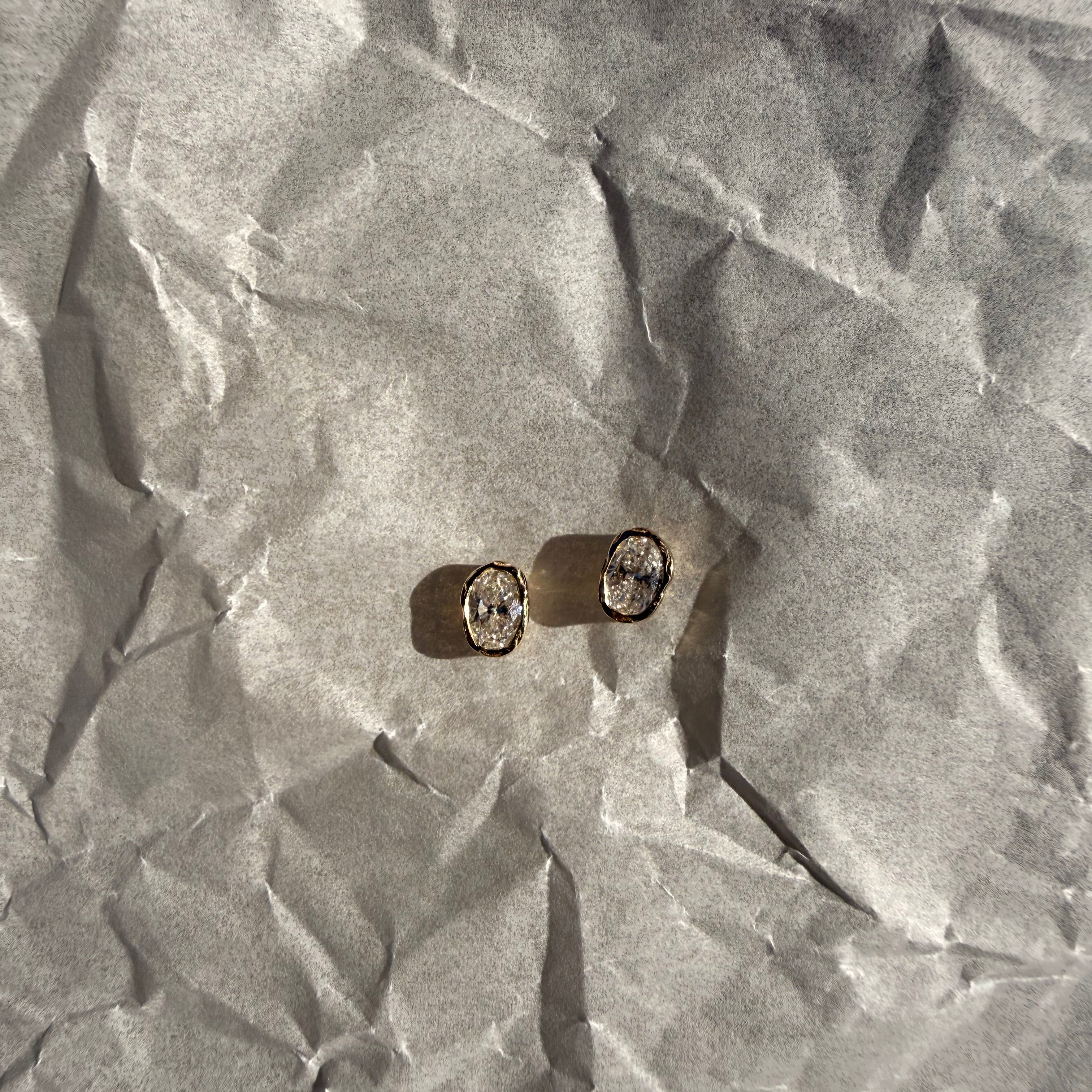 melted oval lab diamond stud earrings in 10 karat yellow gold