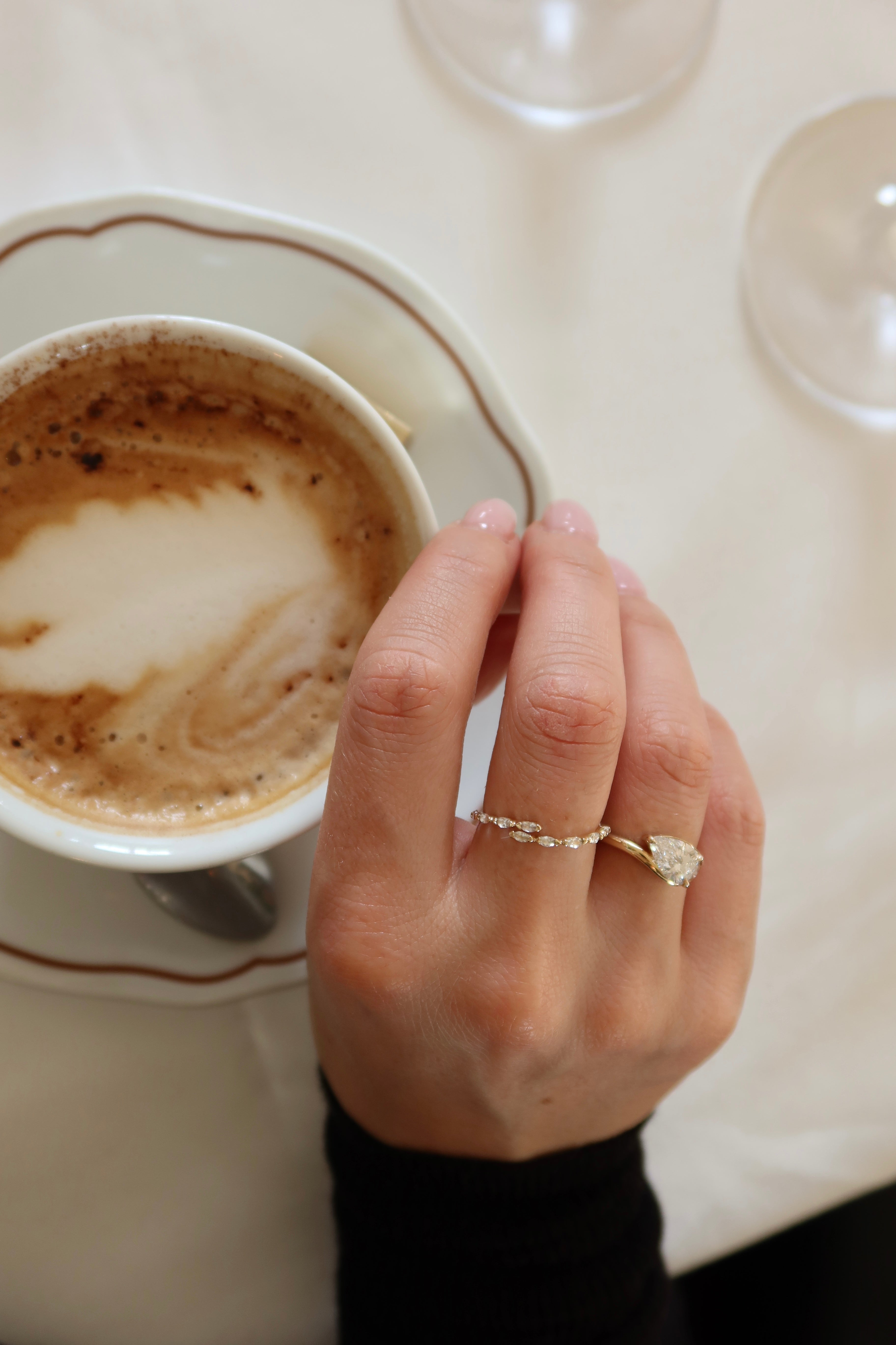 10 karat yellow gold wrap ring with white sapphire stones