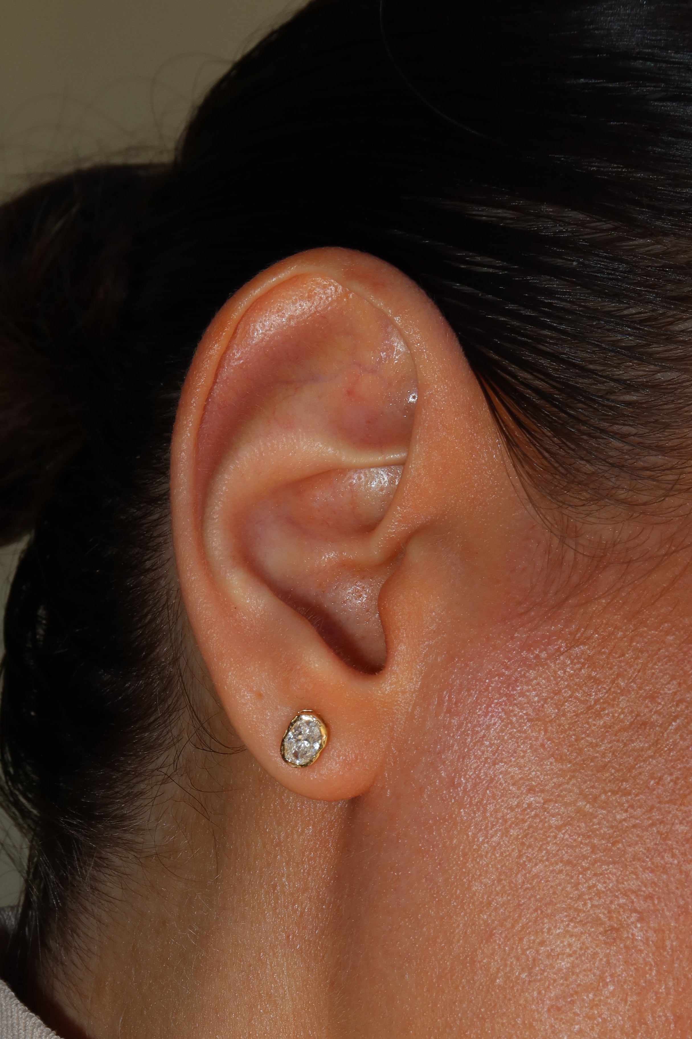 melted oval lab diamond stud earrings in 10 karat yellow gold