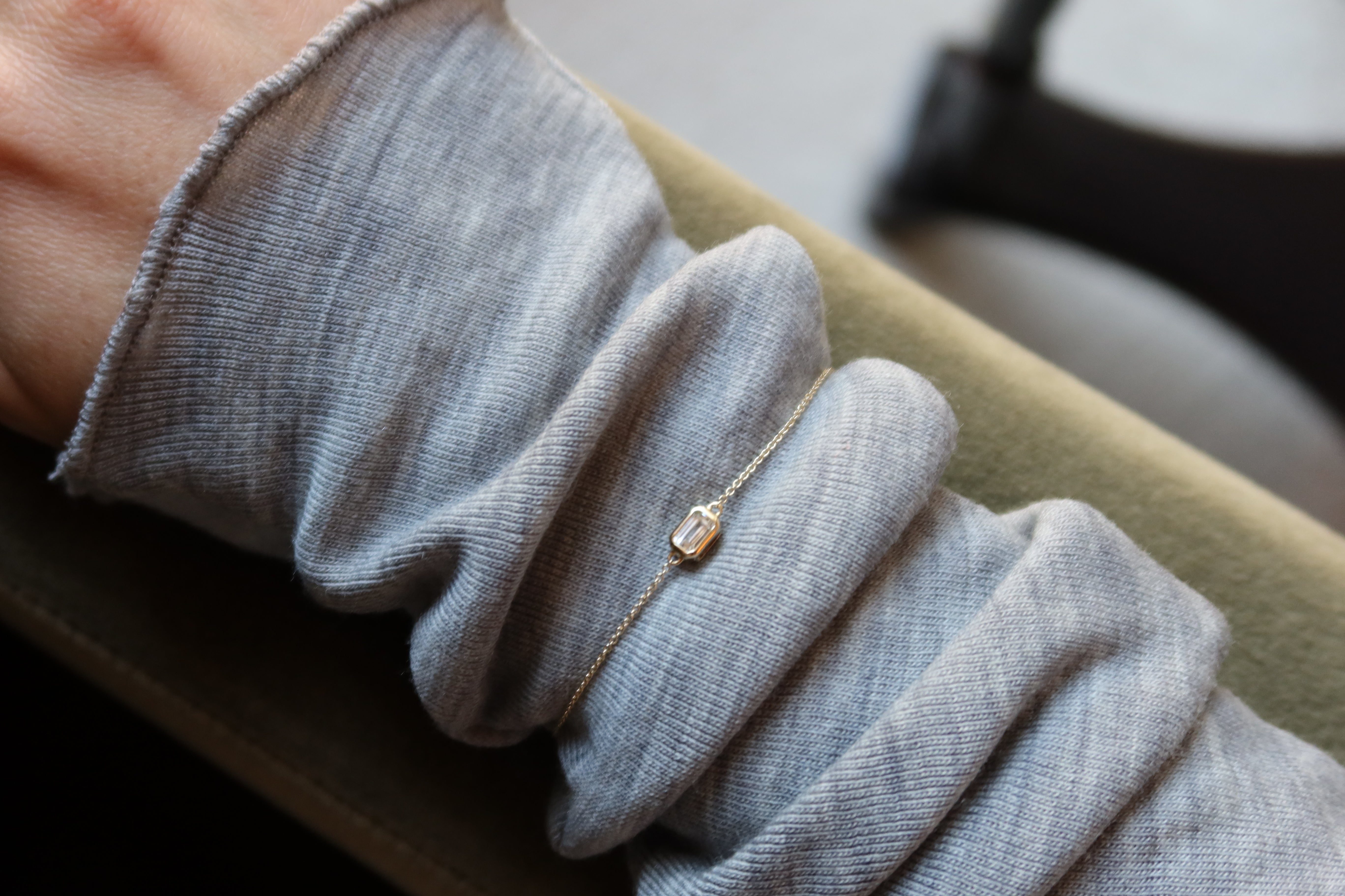 dainty solid gold bracelet with white sapphire